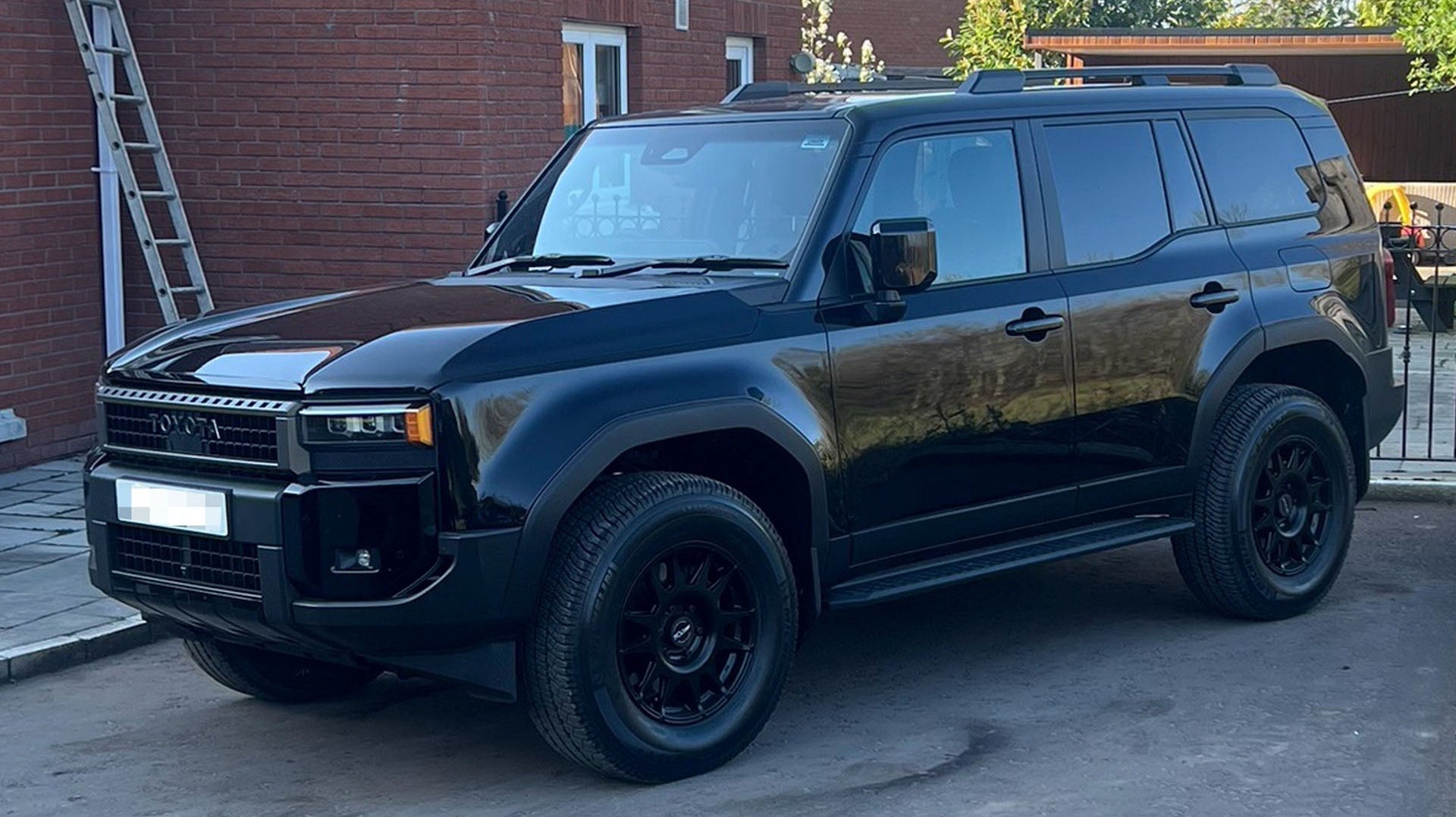 Black Toyota Land Cruiser 250 (2024+) fitted with 18' EVO Corse DakarZero wheels in Matte Black