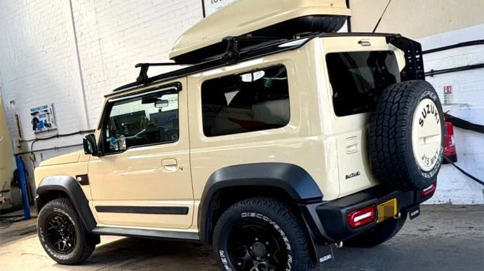 Chiffon Ivory Suzuki Jimny with 16" Magpie Wheels in Satin Black