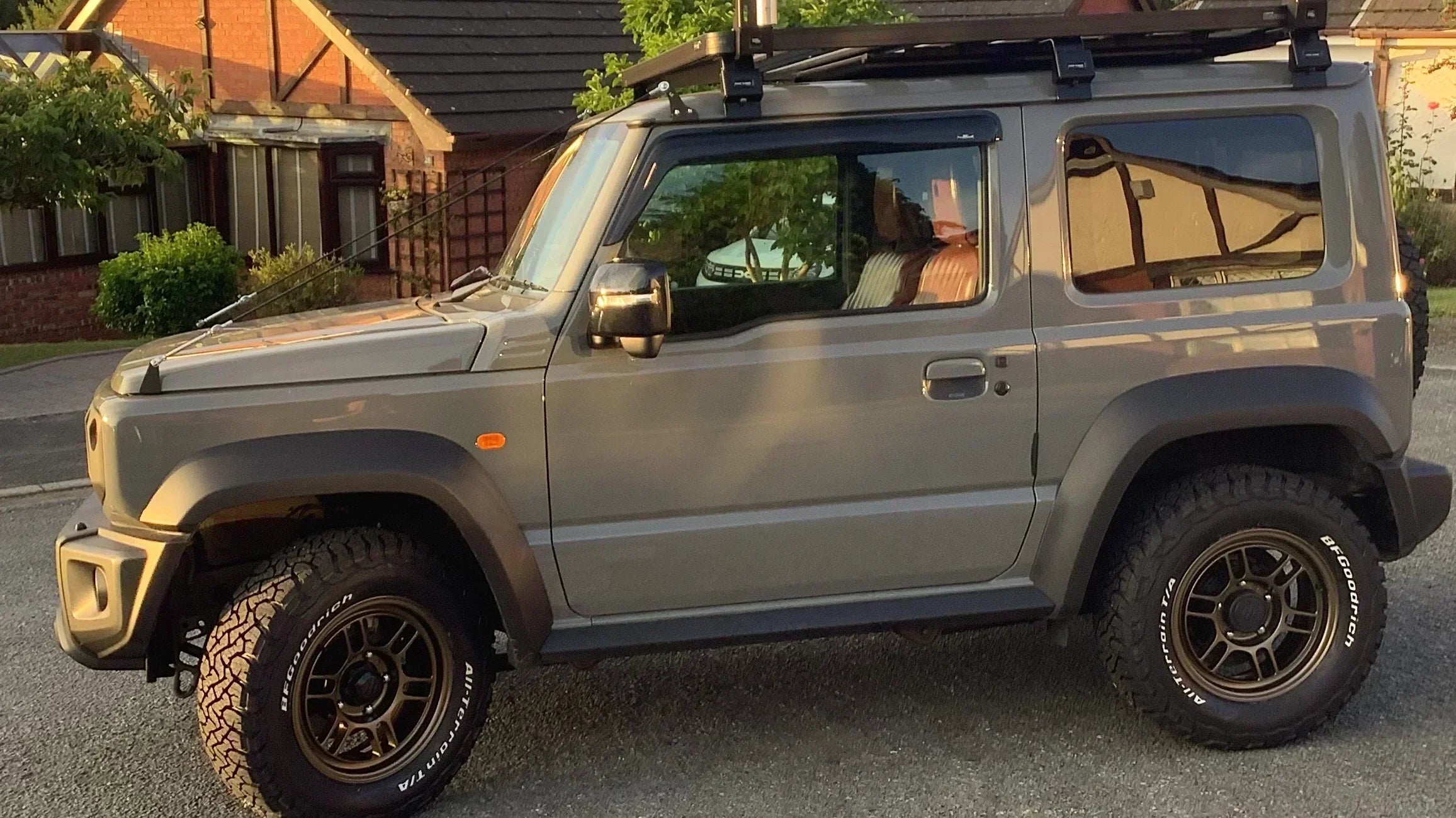 Grey Suzuki Jimny (2018+) with 16" ENKEI ALLROAD RPT1 Wheels in Matte Bronze