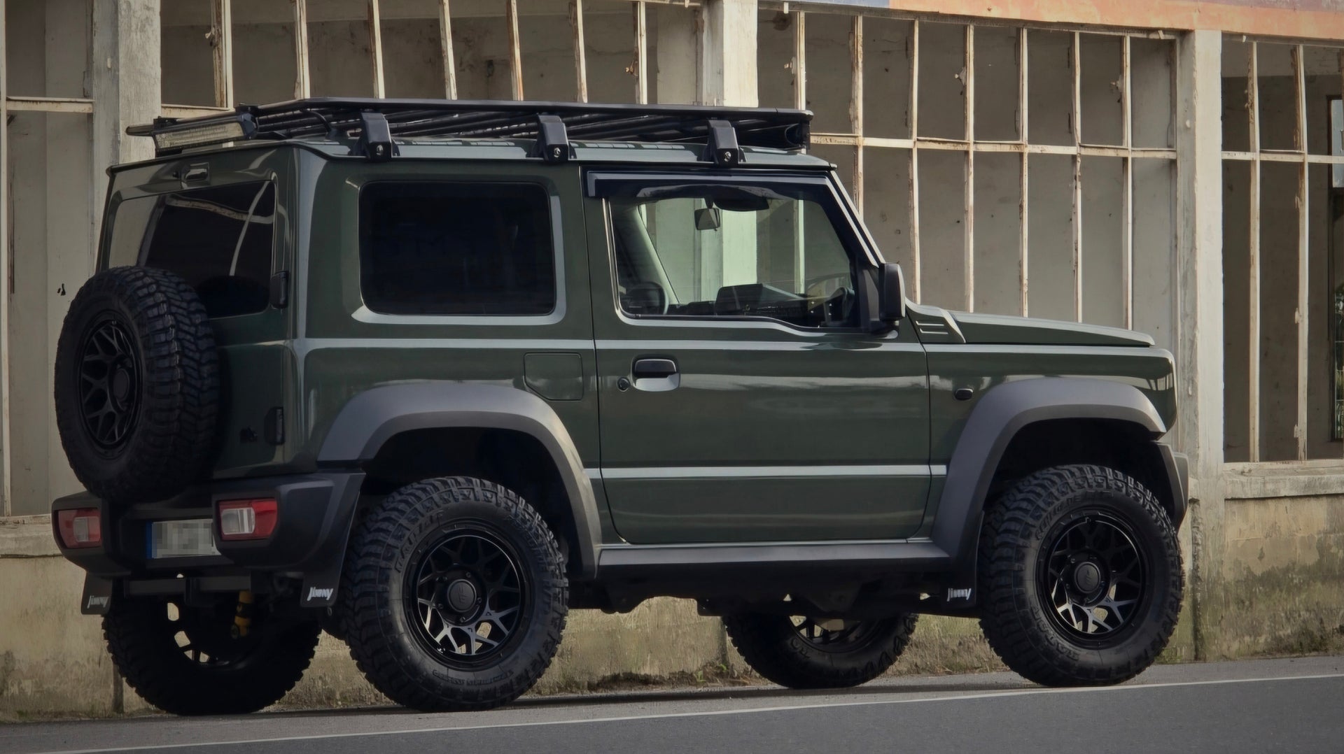 Green Suzuki Jimny with Satin Black Magpie M-01 Wheels