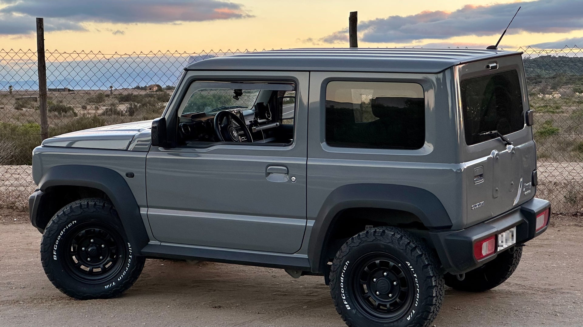 Grey Suzuki Jimny with Matte Black High Peak J-01 wheels