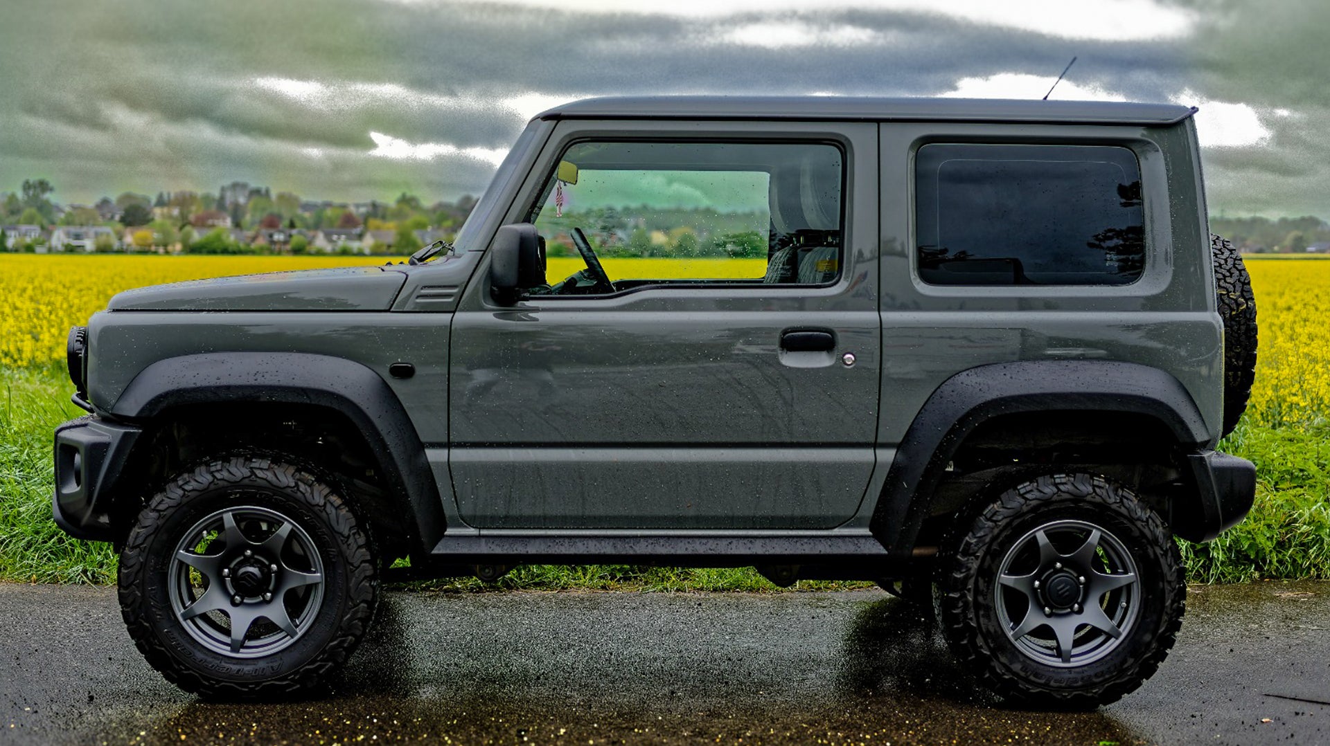 Suzuki Jimny (2018+) with HIGH PEAK J-02 15 inch wheels with a Retro Front Grille and JimnyStyle Smoked LED Lights and other accessories from Street Track Life JimnyStyle