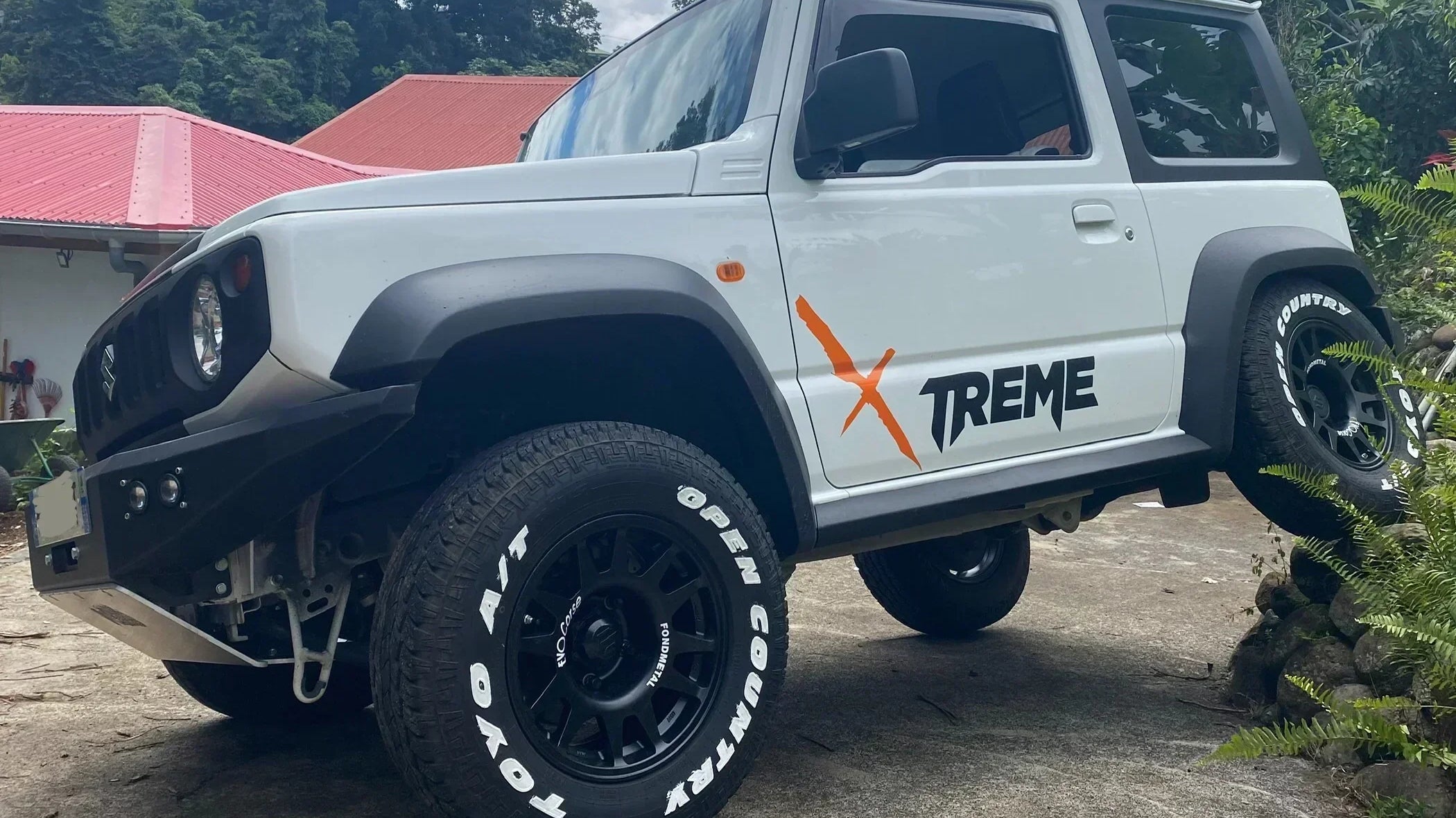 Suzuki Jimny (2018+) with -25ET EVO Corse DakarZero wheels in Matte Black