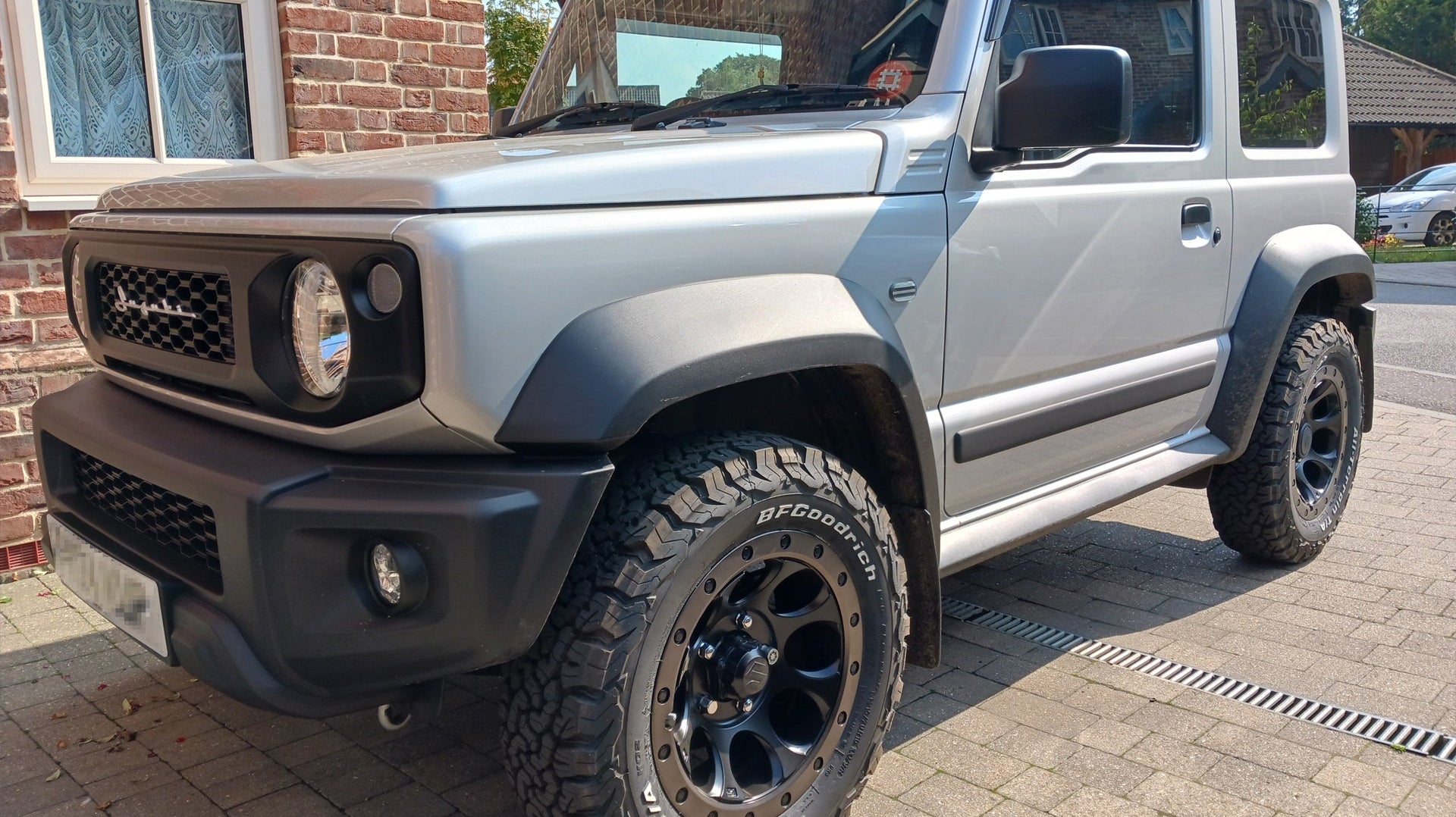 Silver Suzuki Jimny with Satin Black XTREME-J XJ03 Wheels