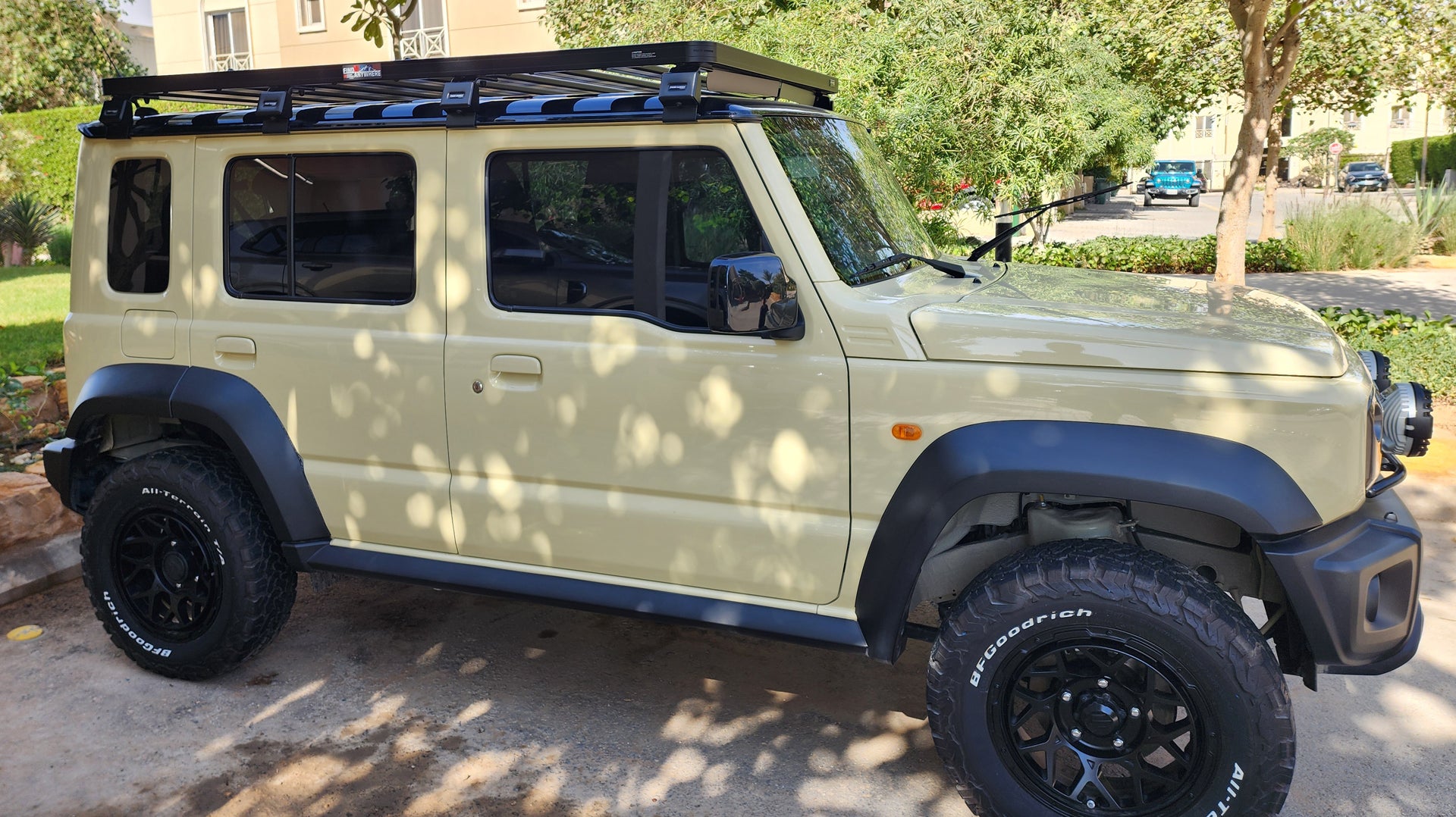 Beige Suzuki Jimny fitted with Matte Black Magpie M-01 Wheels