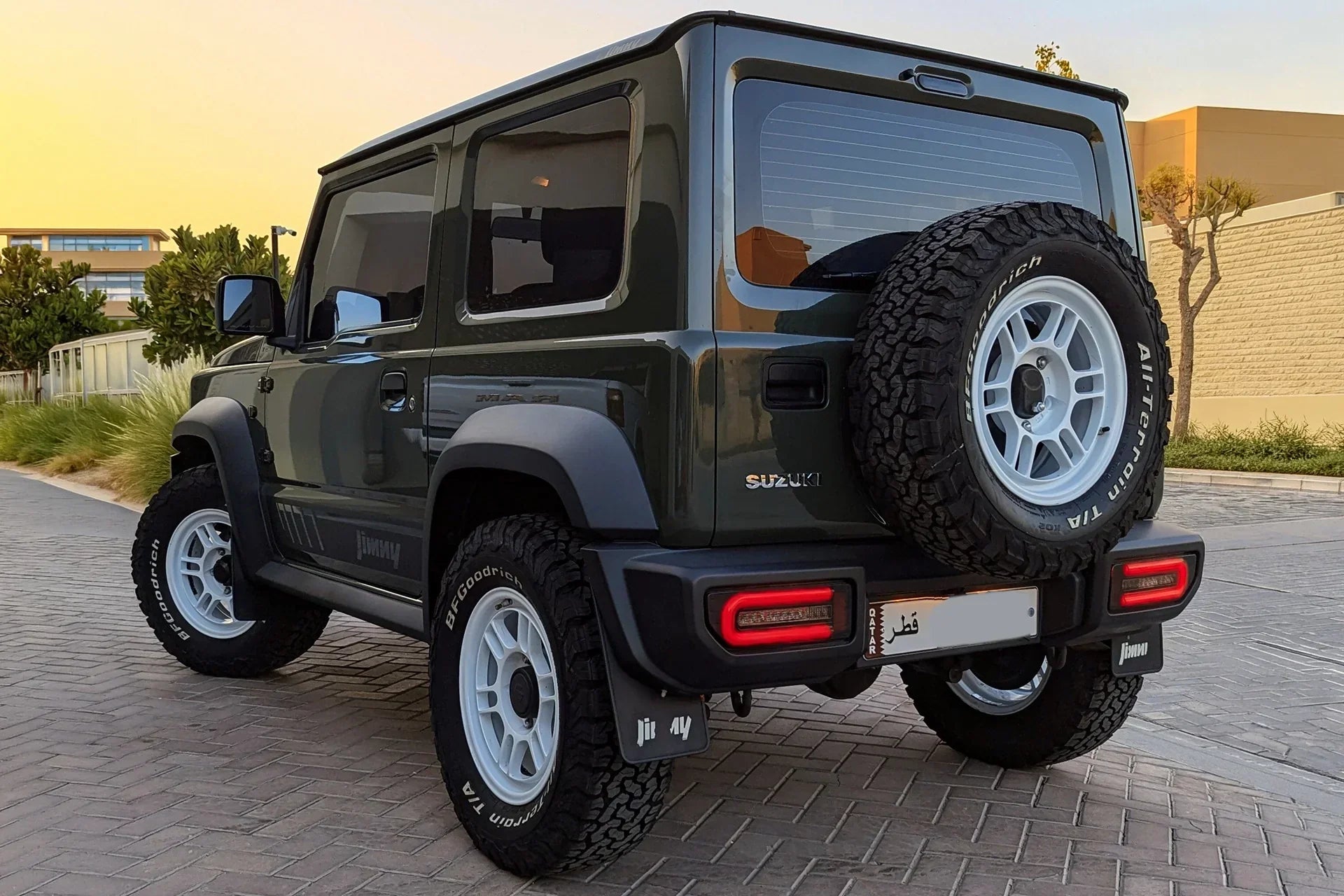 Suzuki Jimny (2018+) with White Enkei Allroad RPT1 Wheels and LED light upgrades.