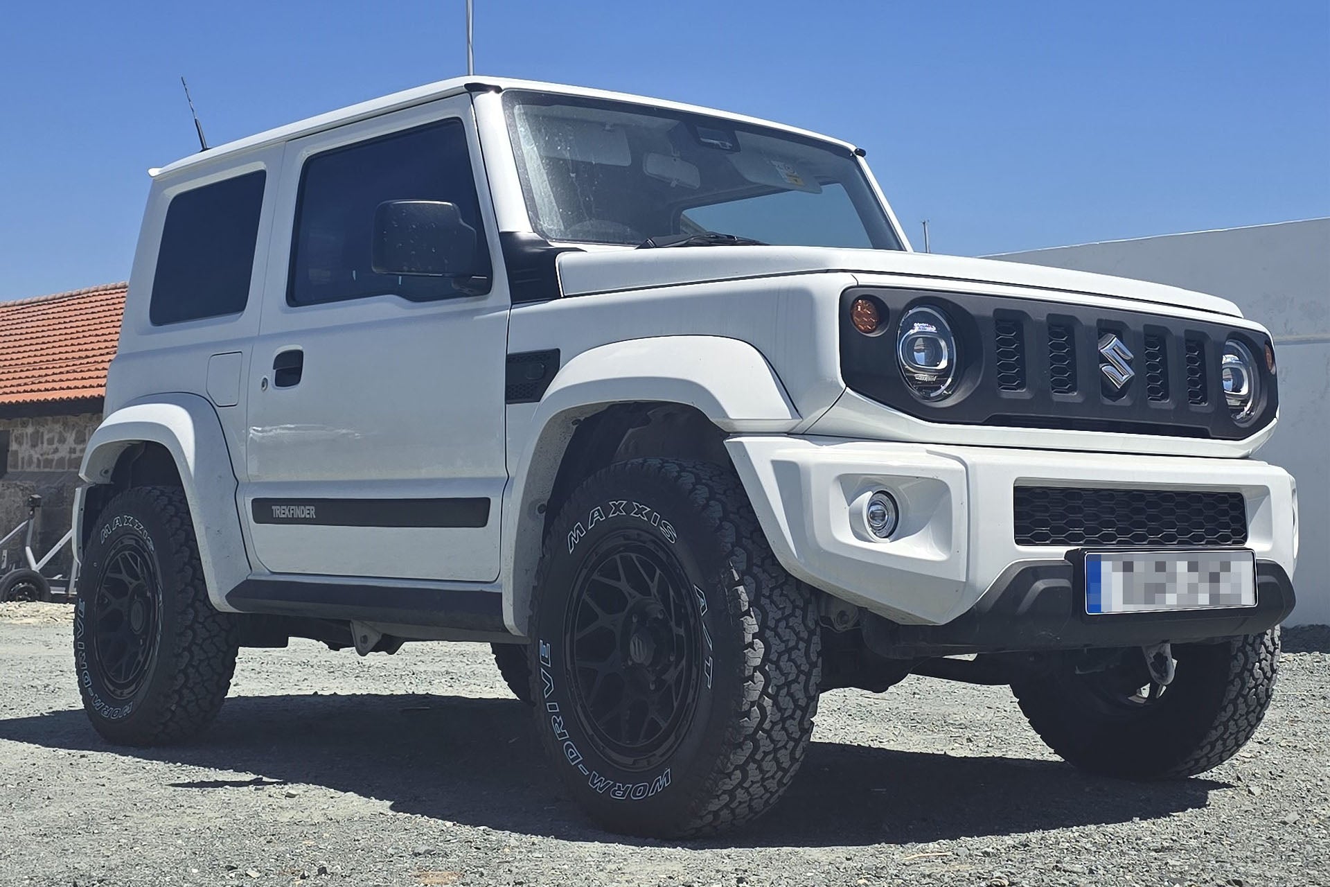 Superior White Suzuki Jimny fitted with Magpie M-01 wheels in Satin Black & various LED Lighting accessories