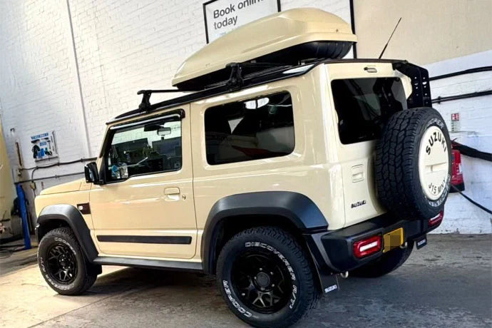 Chiffon Ivory Suzuki Jimny with 16" Magpie Wheels in Satin Black
