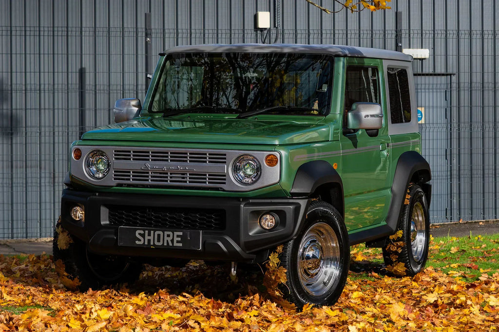 Suzuki Jimny (2018+) with DEAN CROSS COUNTRY Wheels in Silver, with APIO Iron Grille and Suzuki Vintage Emblem