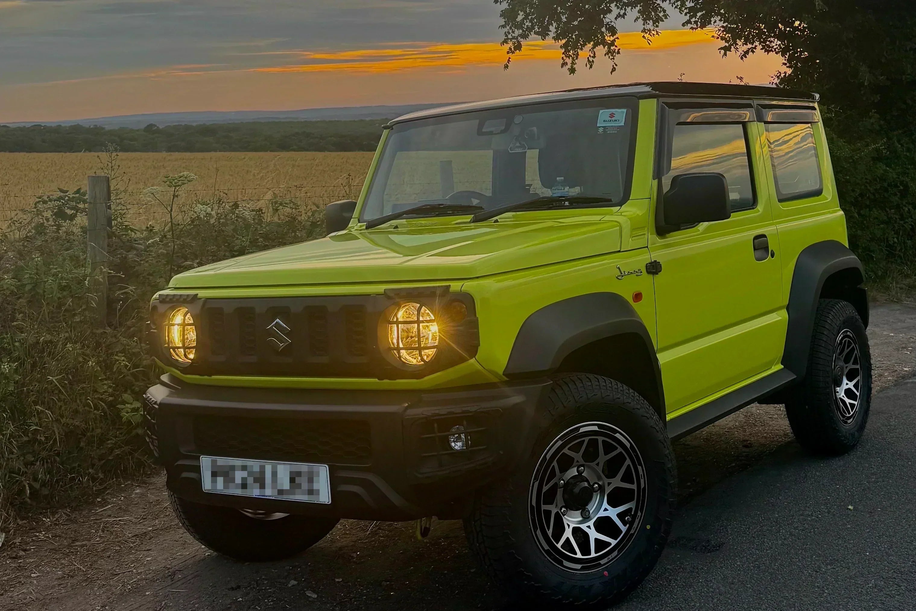 Kinetic Yellow Suzuki Jimny (2018+) with Magpie M-01 wheels in the 'Satin Black with Machined Face' colour variant