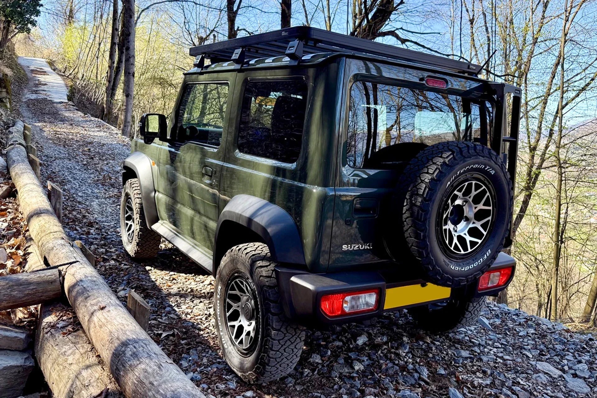 A Jungle Green Suzuki Jimny with 16 inch Magpie M-01 Wheels and a Front Runner Roof Rack!