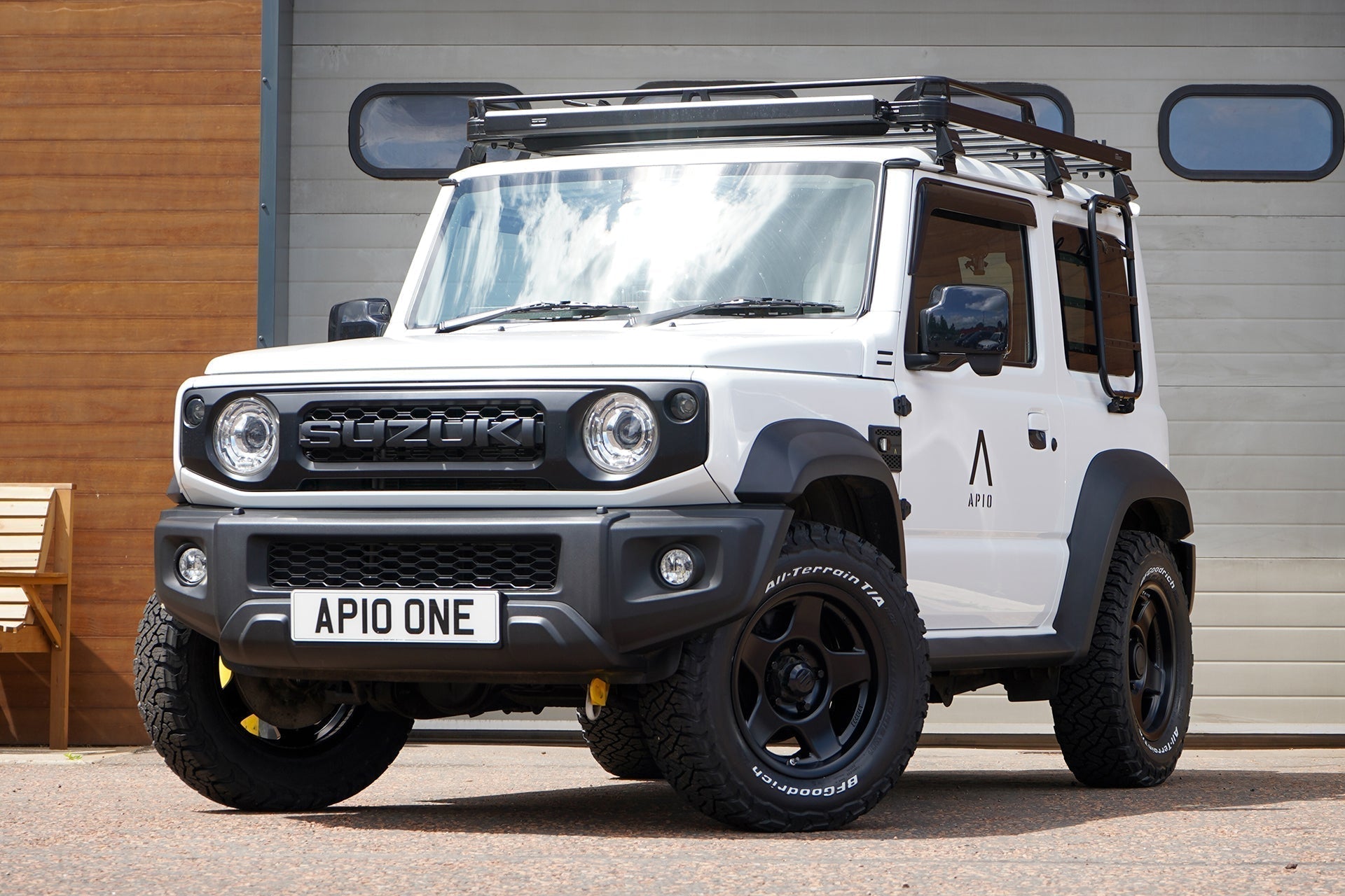 White Suzuki Jimny (2018+) with BRADLEY V Wheels, BF Goodrich KO3 tyres, APIO Decals and accessories