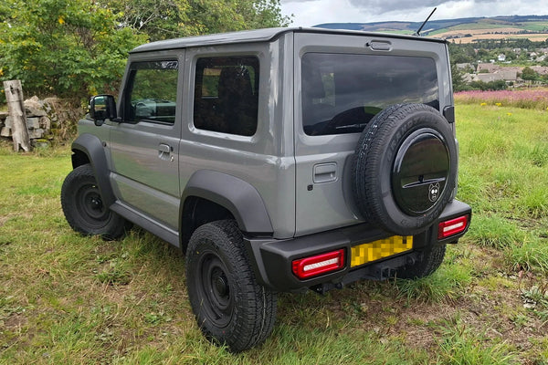 Suzuki Jimny (2018+) with APIO WILDBOAR SR+ wheels, JIMNYSTYLE Touring suspension, Retro Grille and LED tail lights