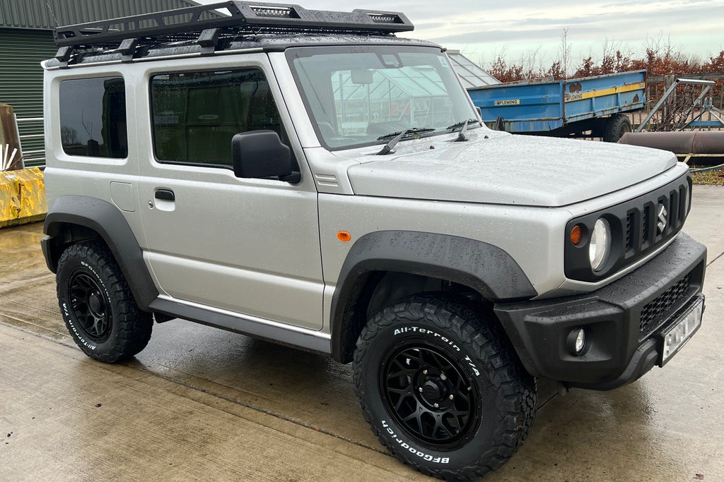 Silver Suzuki Jimny fitted with Satin Black Magpie M-01 Wheels